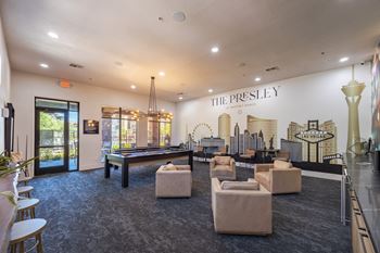 Multi-media room with wifi, game tables, and a verandah style patio